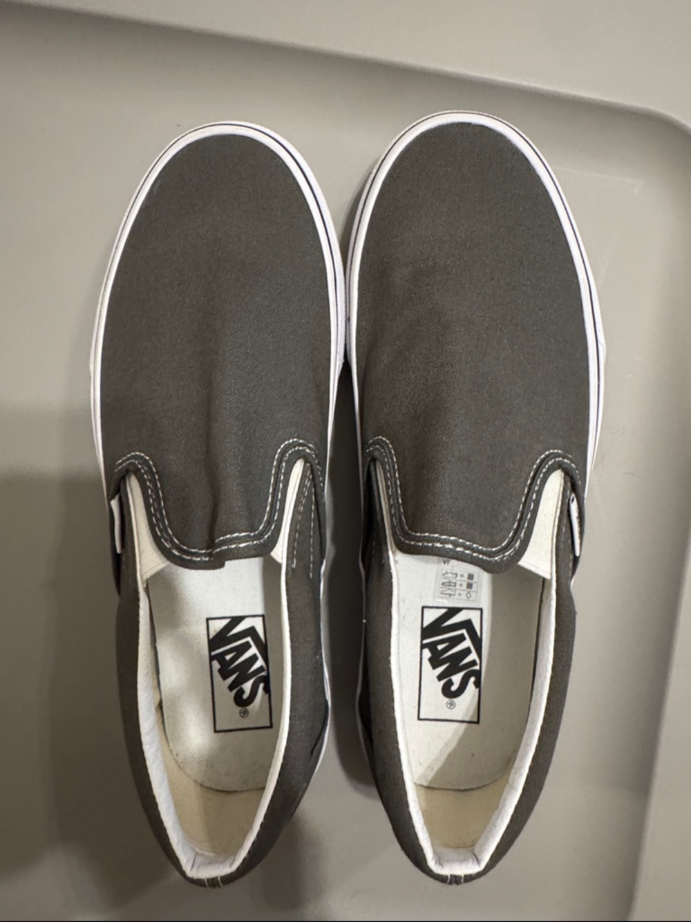 Vans Slip-On Canvas Sneakers in Charcoal Gray